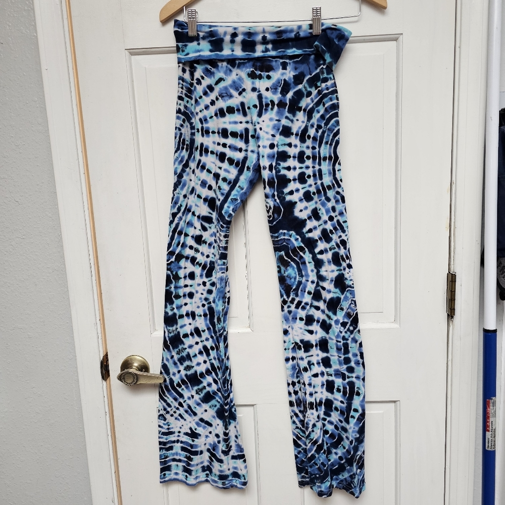 Beautiful size large but fits like medium Tie dyed flare pants.